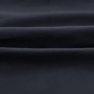 CALIFLO Casual Chic T-shirt Crew Neck Bodysuit black fabric close up 3 Close-up of folded black soft fabric.