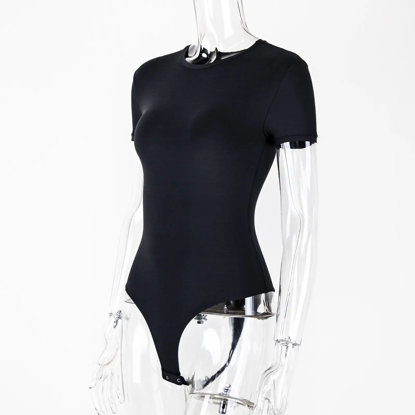 CALIFLO Casual Chic T-shirt Crew Neck Bodysuit black mannequin left side Transparent acrylic mannequin wearing a black t-shirt bodysuit over a white background.