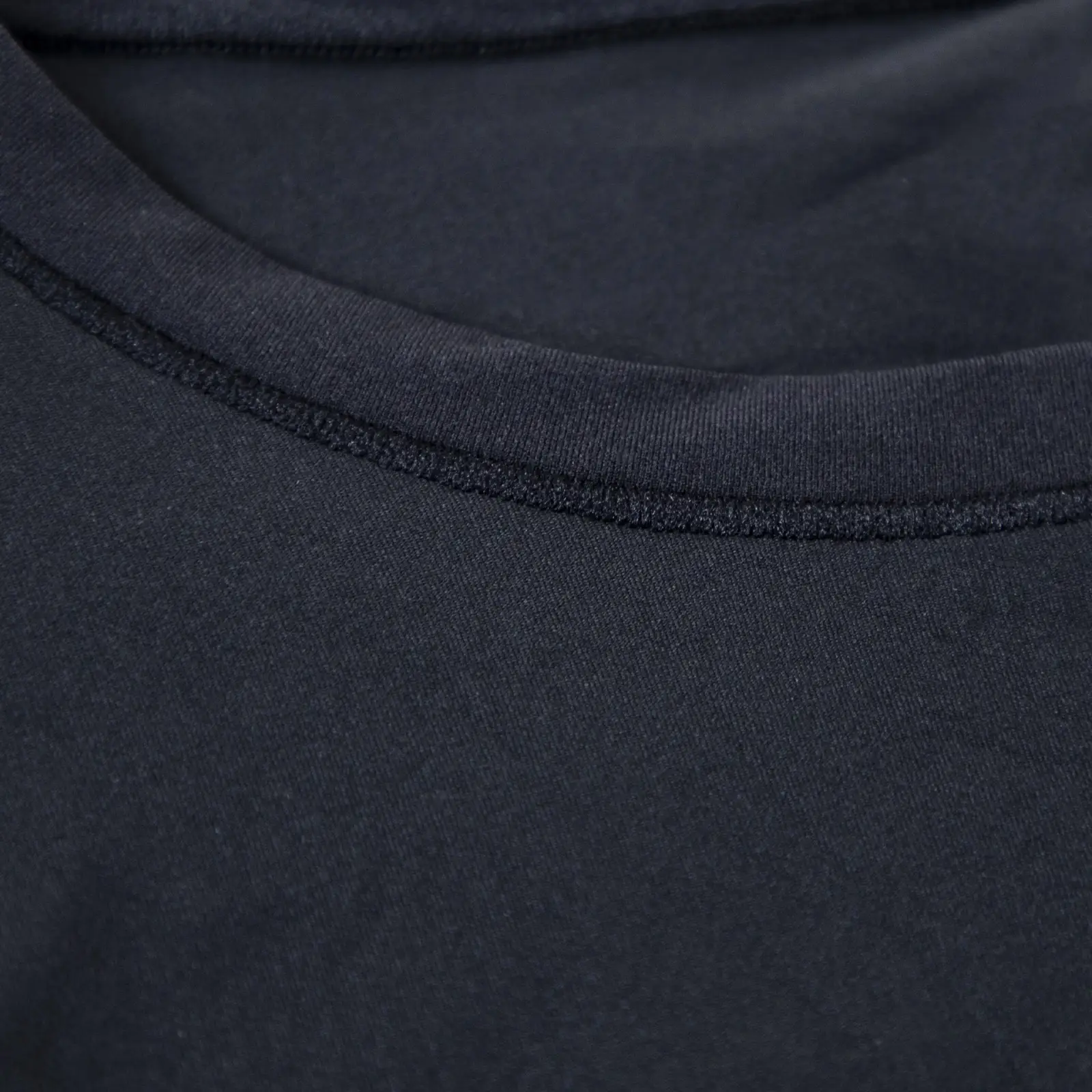 CALIFLO Casual Chic T-shirt Crew Neck Bodysuit black neck fabric close up Close-up of black bodysuit fabric and neck