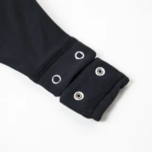 CALIFLO Casual Chic T-shirt Crew Neck Bodysuit black thong snap open Close-up of the snap-on crotch system of a bodysuit.