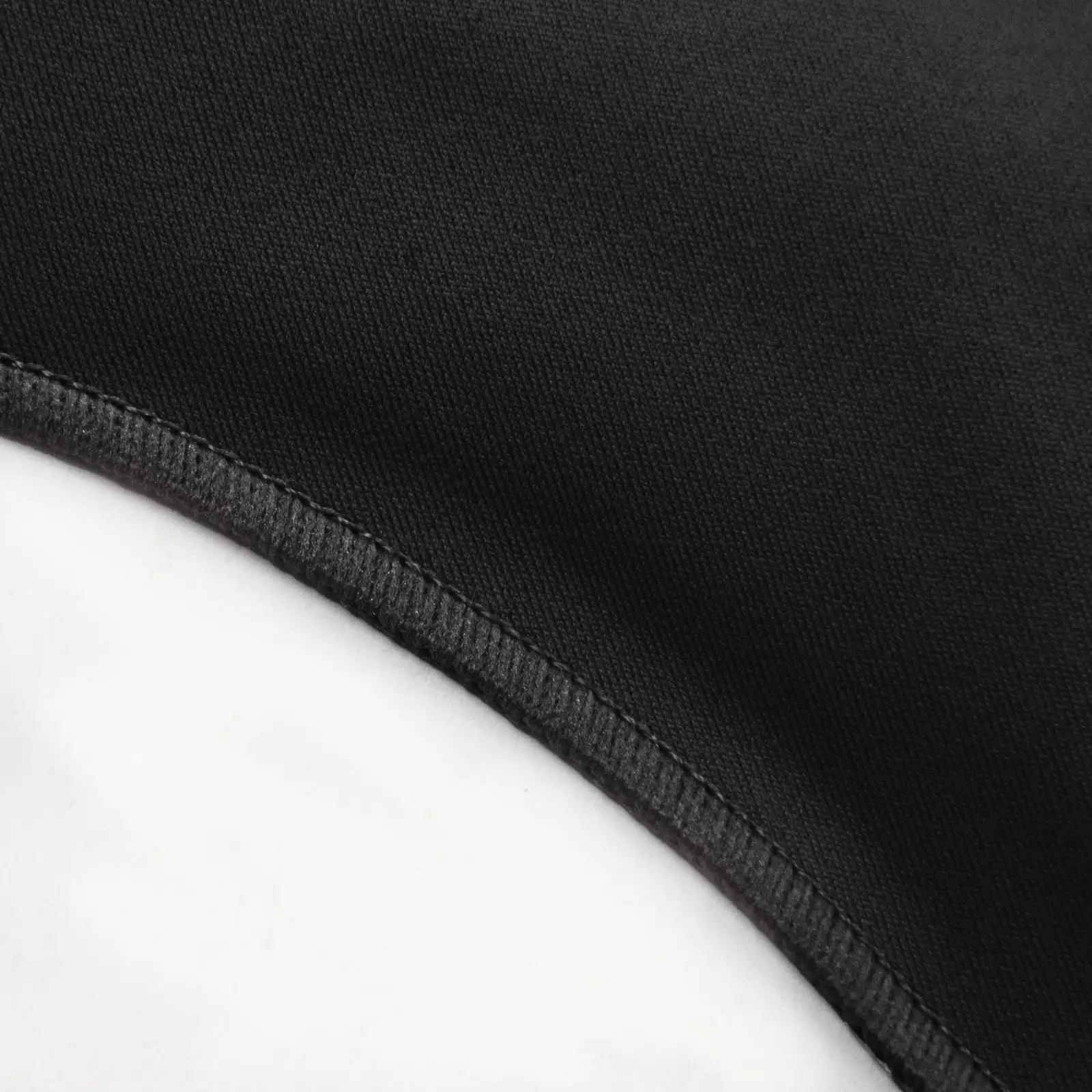 CALIFLO High compression activewear sleeveless high neck bodysuit black fabric close up 3 Snatched Active – High Compression Sleeveless Crew Neck Thong Bodysuit - Black - Product View