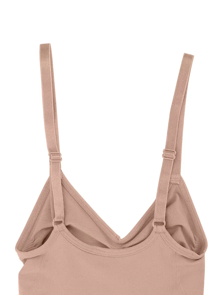 Close-up of beige brief bodysuit adjustable straps over a white background
