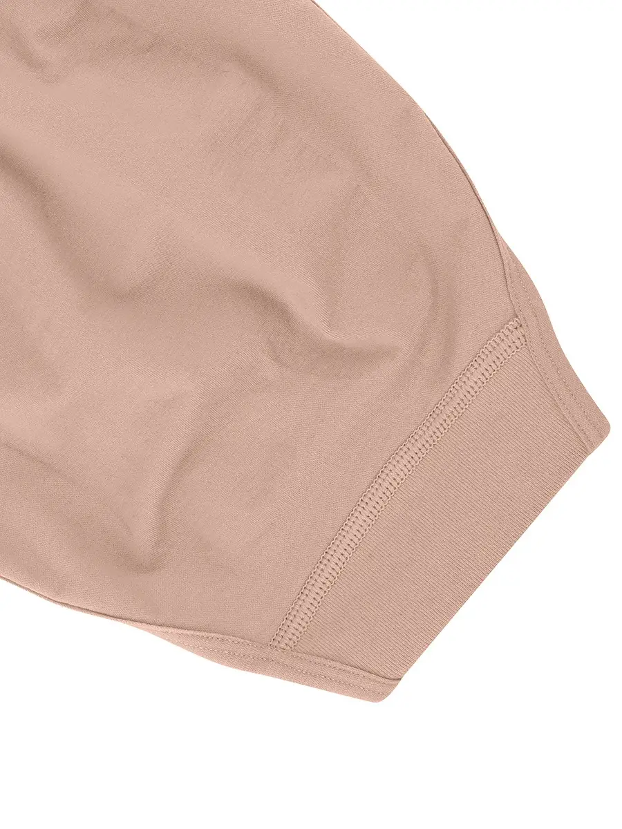 Close-up of backside of beige brief bodysuit bottom