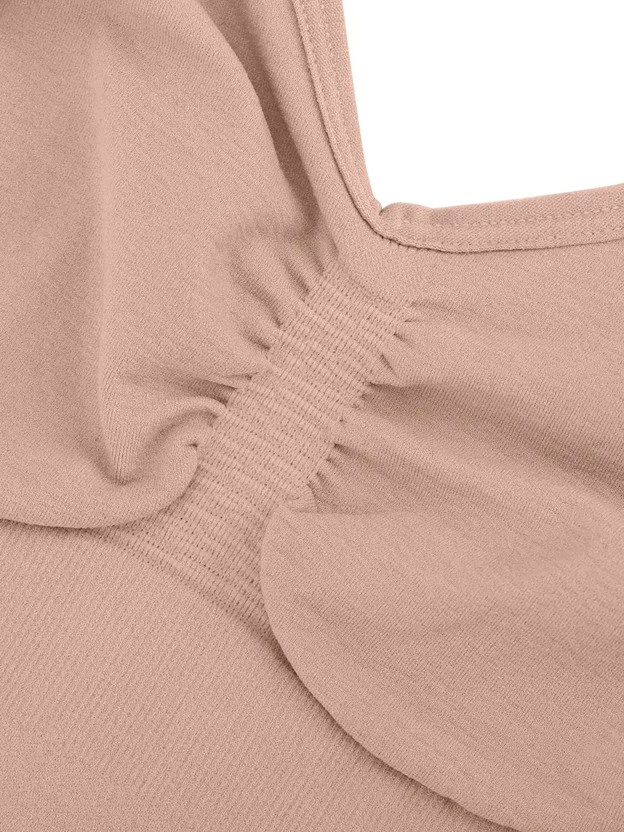 Close-up of beige brief bodysuit bra cups over a white background