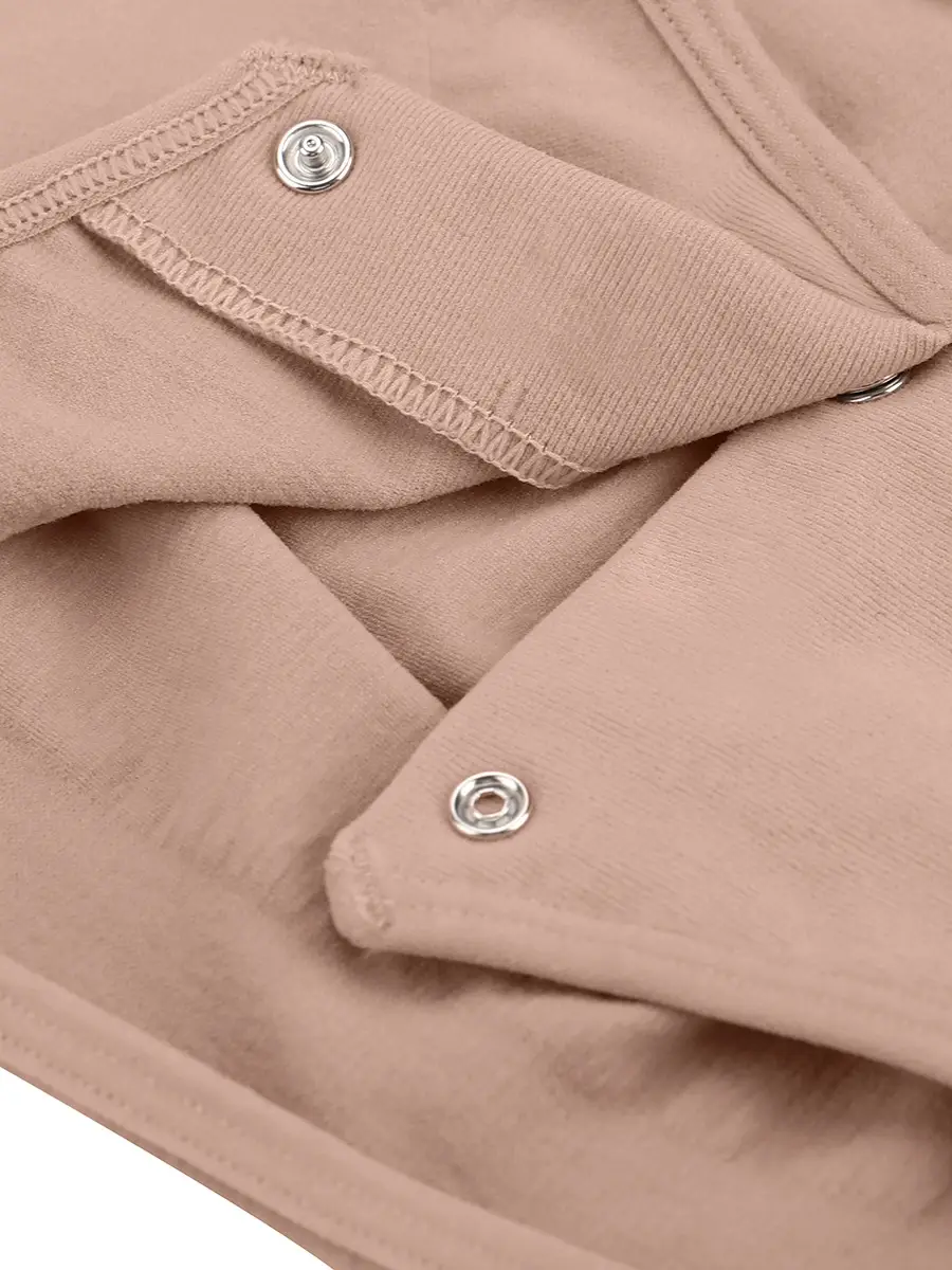 Close-up of beige brief bodysuit snap closure