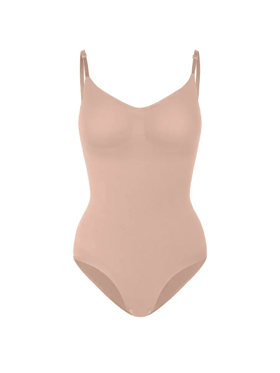 Illustration cutout of beige brief bodysuit over a white background