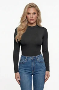 Woman_wearing_black_long_sleeve_crew_cut_snatched_bodysuit_blue_jeans