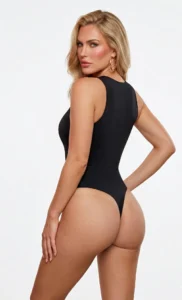 Woman_wearing_black_snatched_sleeveless_crew_cut_bodysuit_backside_thong