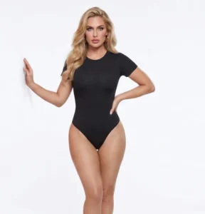 Woman_wearing_snatched_t-shirt_bodysuit_white_background Model wearing CALIFLO T-Shirt Bodysuit