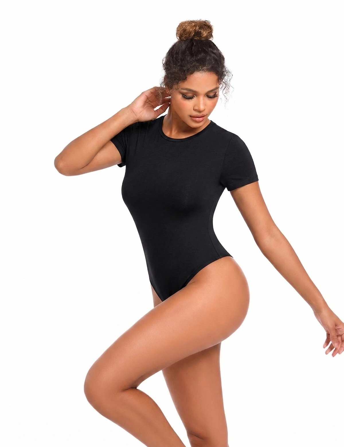 Leah wearing the Thunder Soft Black T-Shirt Bodysuit Leah wearing a black bodysuit over a white background